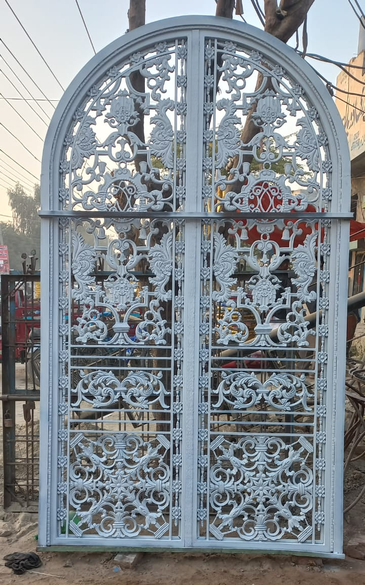 Arched White Ornate Main Door