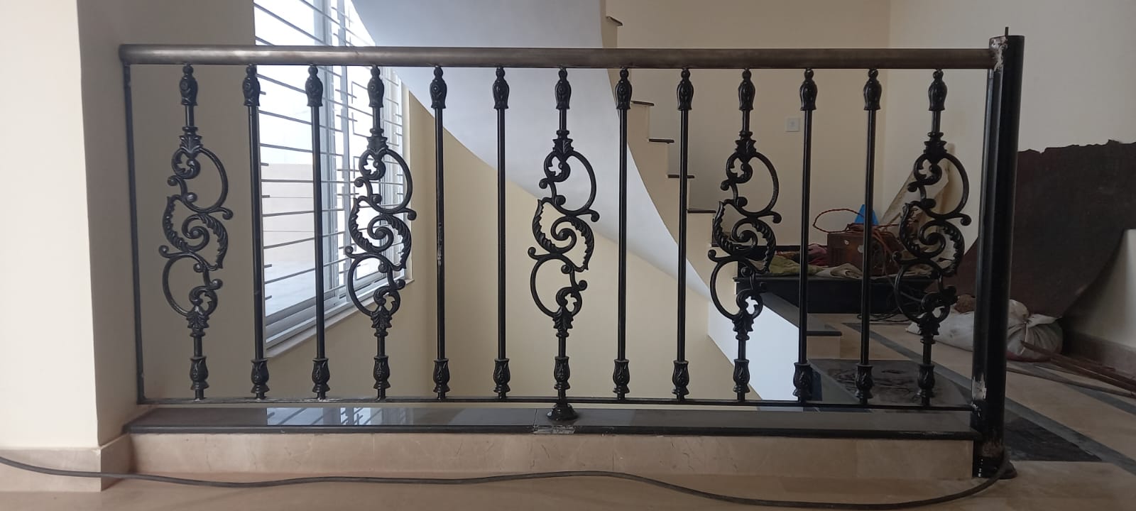 Minimalist Black Iron Scroll Railing