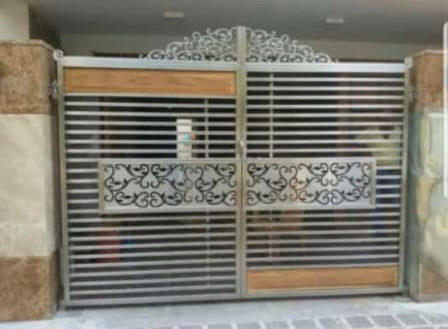 Steel Slat and Scrollwork Gate